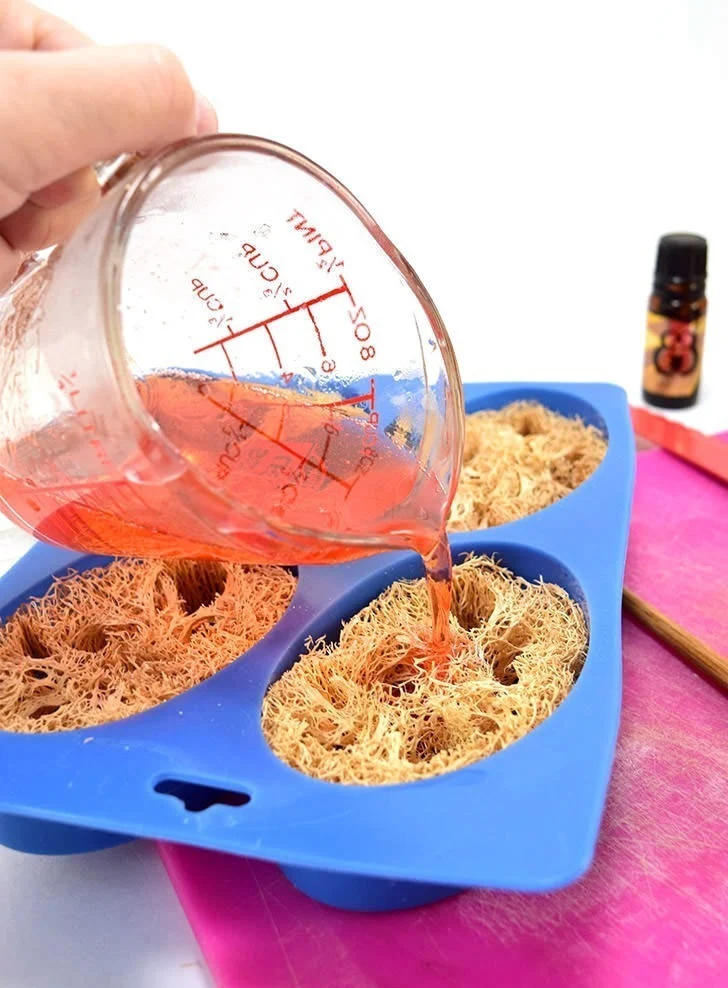 Learn how to make homemade soap, adding loofah to the mix for the perfect exfoliant. Perfect for even a first-time soap maker, these loofah soap bars are super simple and make great gifts!