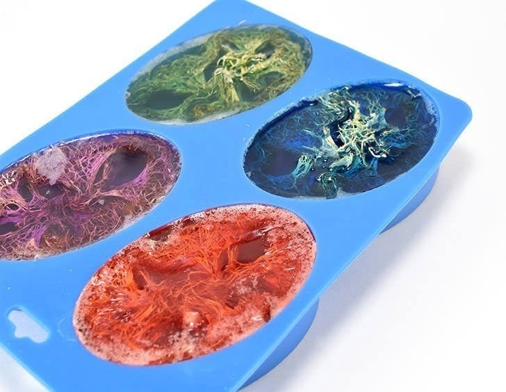 Learn how to make homemade soap, adding loofah to the mix for the perfect exfoliant. Perfect for even a first-time soap maker, these loofah soap bars are super simple and make great gifts!