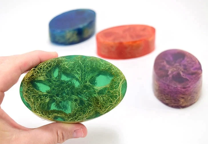 Learn how to make homemade soap, adding loofah to the mix for the perfect exfoliant. Perfect for even a first-time soap maker, these loofah soap bars are super simple and make great gifts!