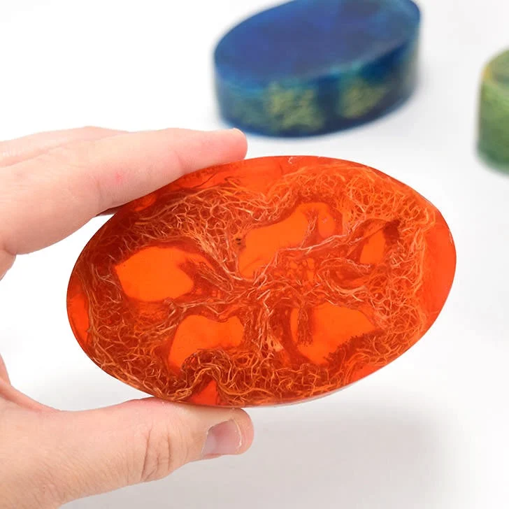 Learn how to make homemade soap, adding loofah to the mix for the perfect exfoliant. Perfect for even a first-time soap maker, these loofah soap bars are super simple and make great gifts!