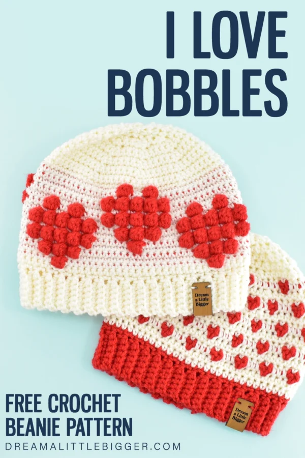 Love Bobbles? Grab this free Crochet Pattern to make the cutest beanies that feature hearts made from crochet bobbles!