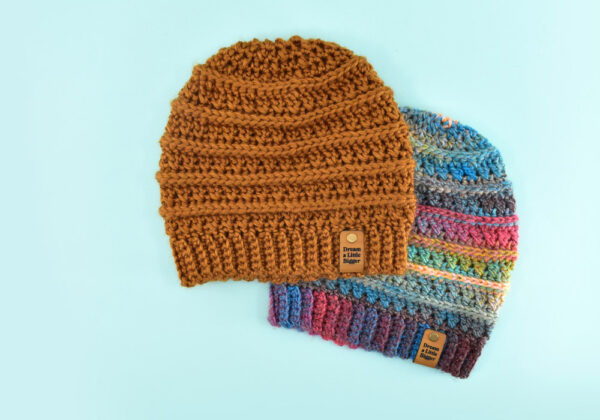 Looking for a beginner friendly free crochet hat pattern perfect for men and women? Using crossed double crochet stitches, this hat is a simple stunner.