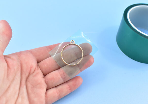 Attach resin tape securely to the backside of your open back bezel.