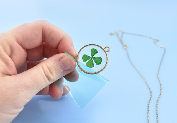 Once your topmost layer of resin has been cured and cooled, remove the resin tape from the back, gently peeling away.
