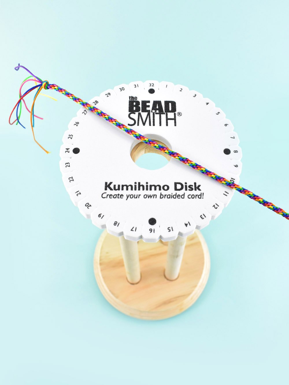 Love Kumihimo but don't love holding the disk? This DIY rotating Kumihimo stand is perfect for all braiders including those with arthritis!