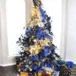 Looking for a unique and elegant Christmas tree? This peacock tree follows a peacock's tail from the top where the bird perches to the bottom. When displayed with a rotating base, the sight is magical!