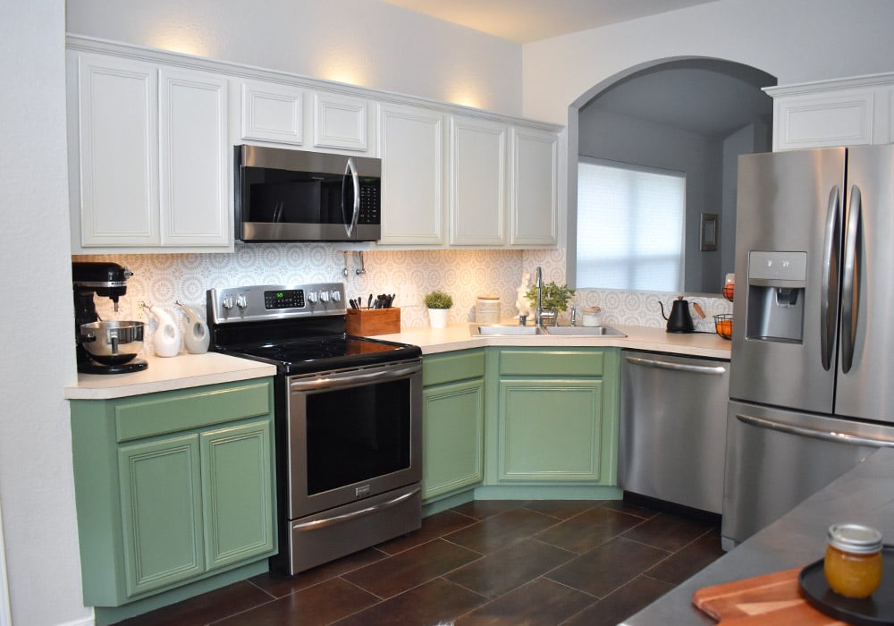Want to update your kitchen on a budget? See how we made our own DIY peel and stick backsplash tile for a whole new look!